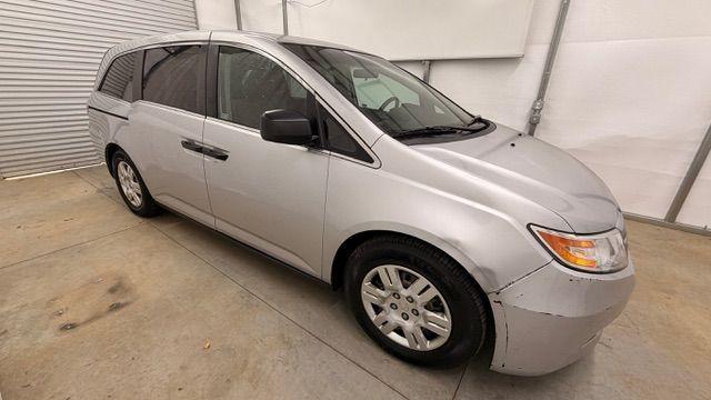 2013 Silver Honda Odyssey LX (5FNRL5H24DB) with an 3.5L V-6 i-VTEC variable valve control engine, located at 1806 Veterans Memorial Hwy SW, Austell, GA, 30168, (770) 944-9558, 33.817959, -84.606987 - Photo#7