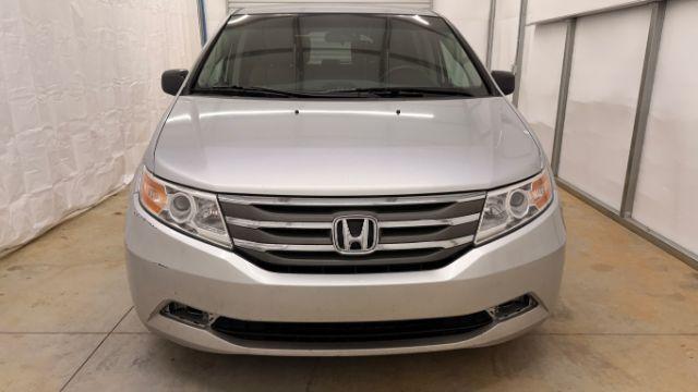 2013 Silver Honda Odyssey LX (5FNRL5H24DB) with an 3.5L V-6 i-VTEC variable valve control engine, located at 1806 Veterans Memorial Hwy SW, Austell, GA, 30168, (770) 944-9558, 33.817959, -84.606987 - Photo#9