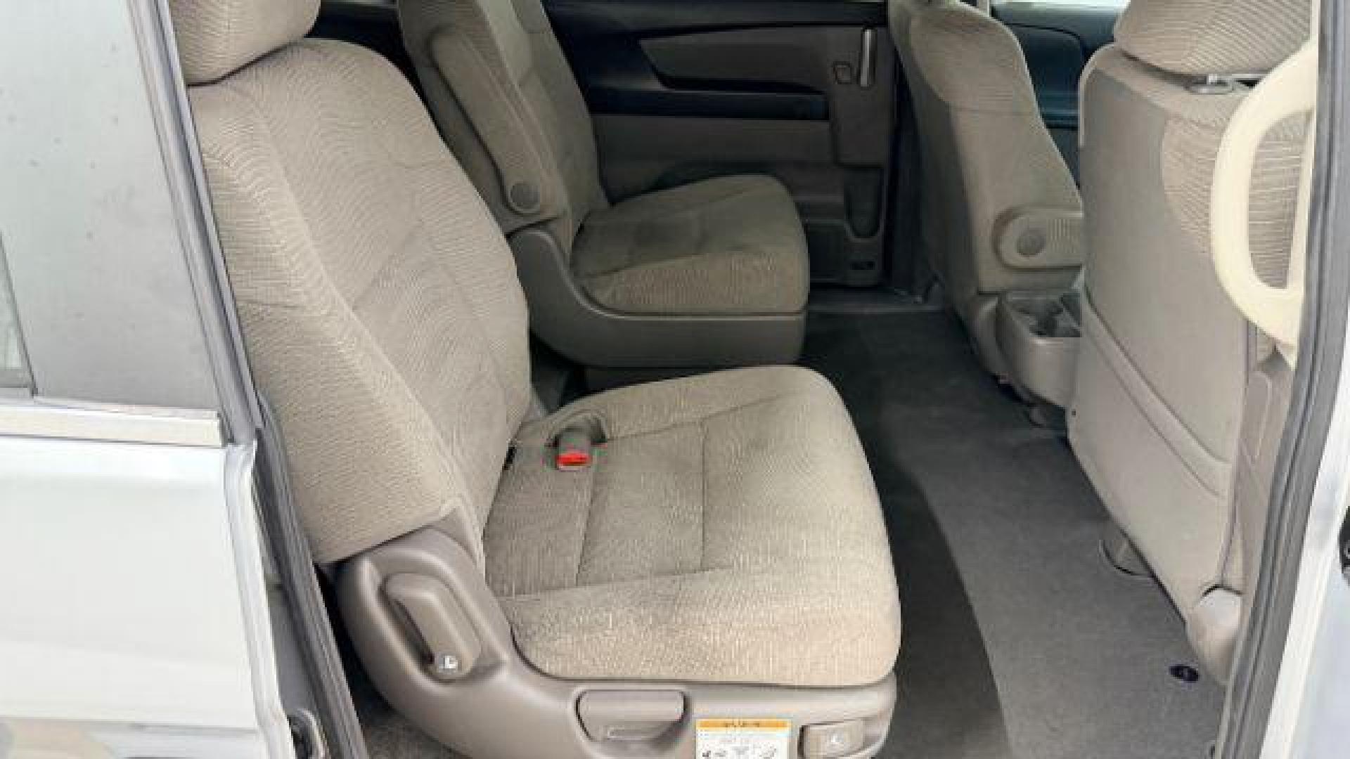 2013 Silver Honda Odyssey LX (5FNRL5H24DB) with an 3.5L V-6 i-VTEC variable valve control engine, located at 1806 Veterans Memorial Hwy SW, Austell, GA, 30168, (770) 944-9558, 33.817959, -84.606987 - Photo#14