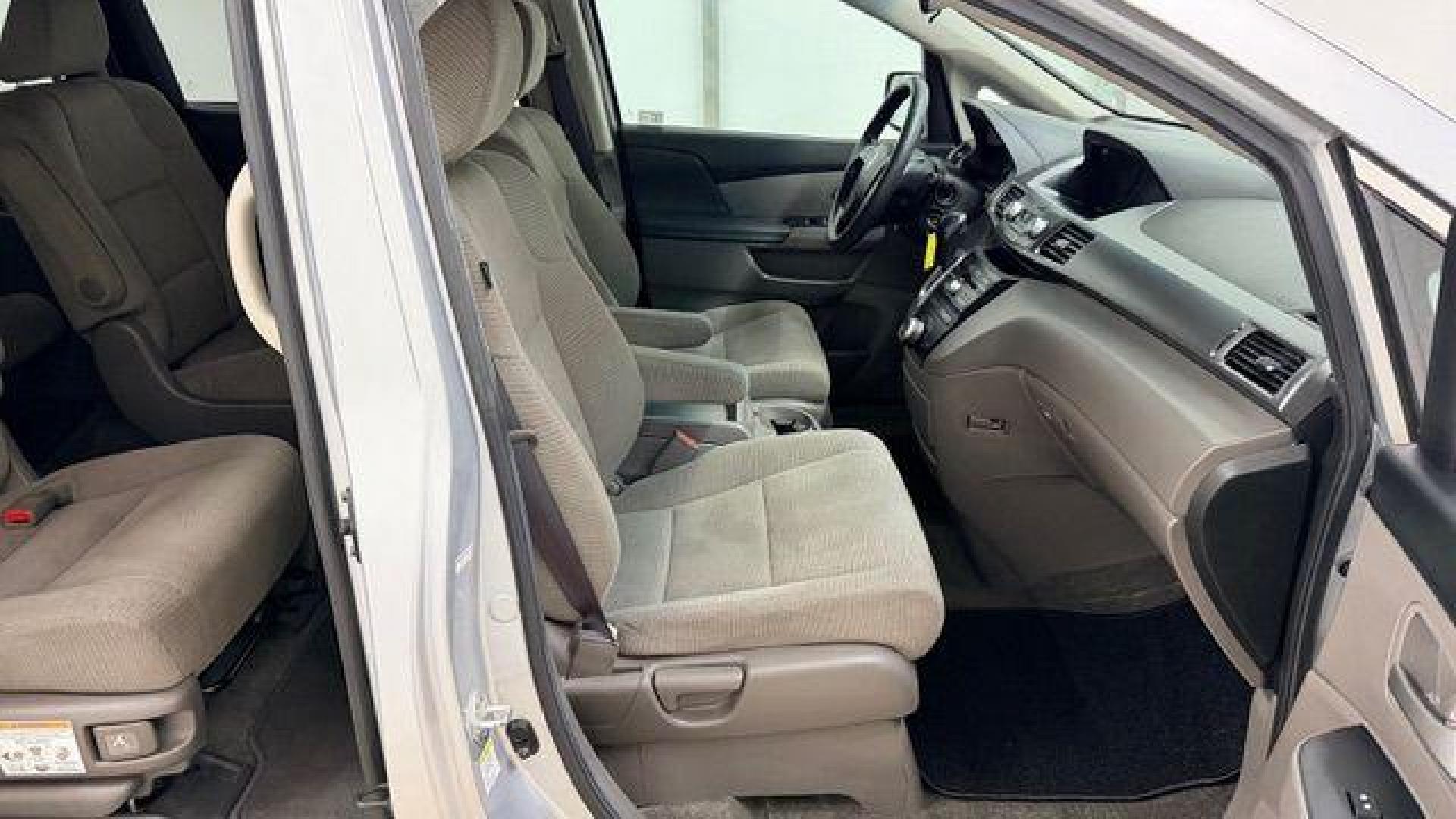 2013 Silver Honda Odyssey LX (5FNRL5H24DB) with an 3.5L V-6 i-VTEC variable valve control engine, located at 1806 Veterans Memorial Hwy SW, Austell, GA, 30168, (770) 944-9558, 33.817959, -84.606987 - Photo#16