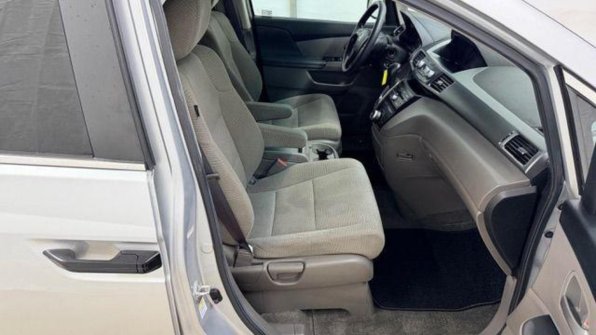 2013 Silver Honda Odyssey LX (5FNRL5H24DB) with an 3.5L V-6 i-VTEC variable valve control engine, located at 1806 Veterans Memorial Hwy SW, Austell, GA, 30168, (770) 944-9558, 33.817959, -84.606987 - Photo#17