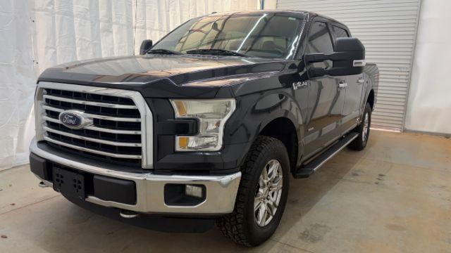 2015 Black Ford F-150 XLT (1FTEW1EG9FF) with an EcoBoost 3.5L V-6 gasoline direct injection engine, located at 1806 Veterans Memorial Hwy SW, Austell, GA, 30168, (770) 944-9558, 33.817959, -84.606987 - Photo#0