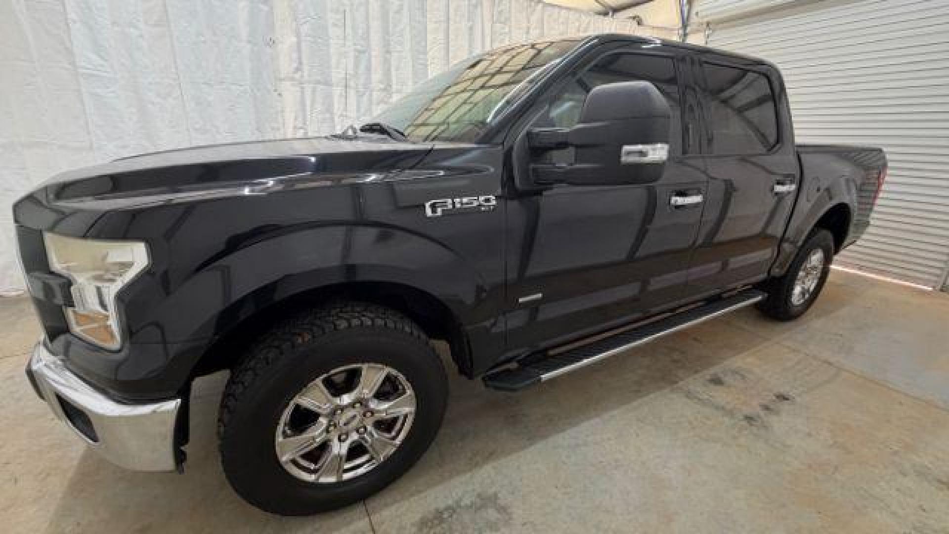 2015 Black Ford F-150 XLT (1FTEW1EG9FF) with an EcoBoost 3.5L V-6 gasoline direct injection engine, located at 1806 Veterans Memorial Hwy SW, Austell, GA, 30168, (770) 944-9558, 33.817959, -84.606987 - Photo#1