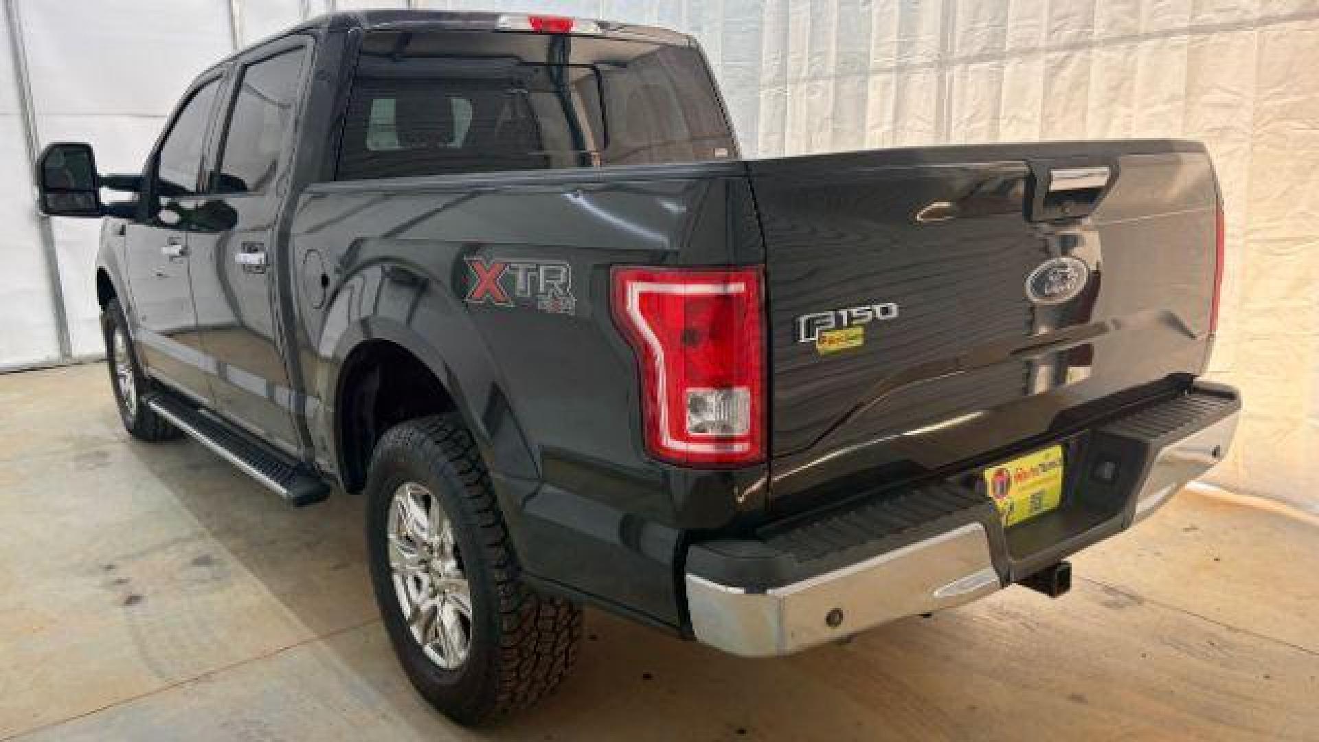 2015 Black Ford F-150 XLT (1FTEW1EG9FF) with an EcoBoost 3.5L V-6 gasoline direct injection engine, located at 1806 Veterans Memorial Hwy SW, Austell, GA, 30168, (770) 944-9558, 33.817959, -84.606987 - Photo#3