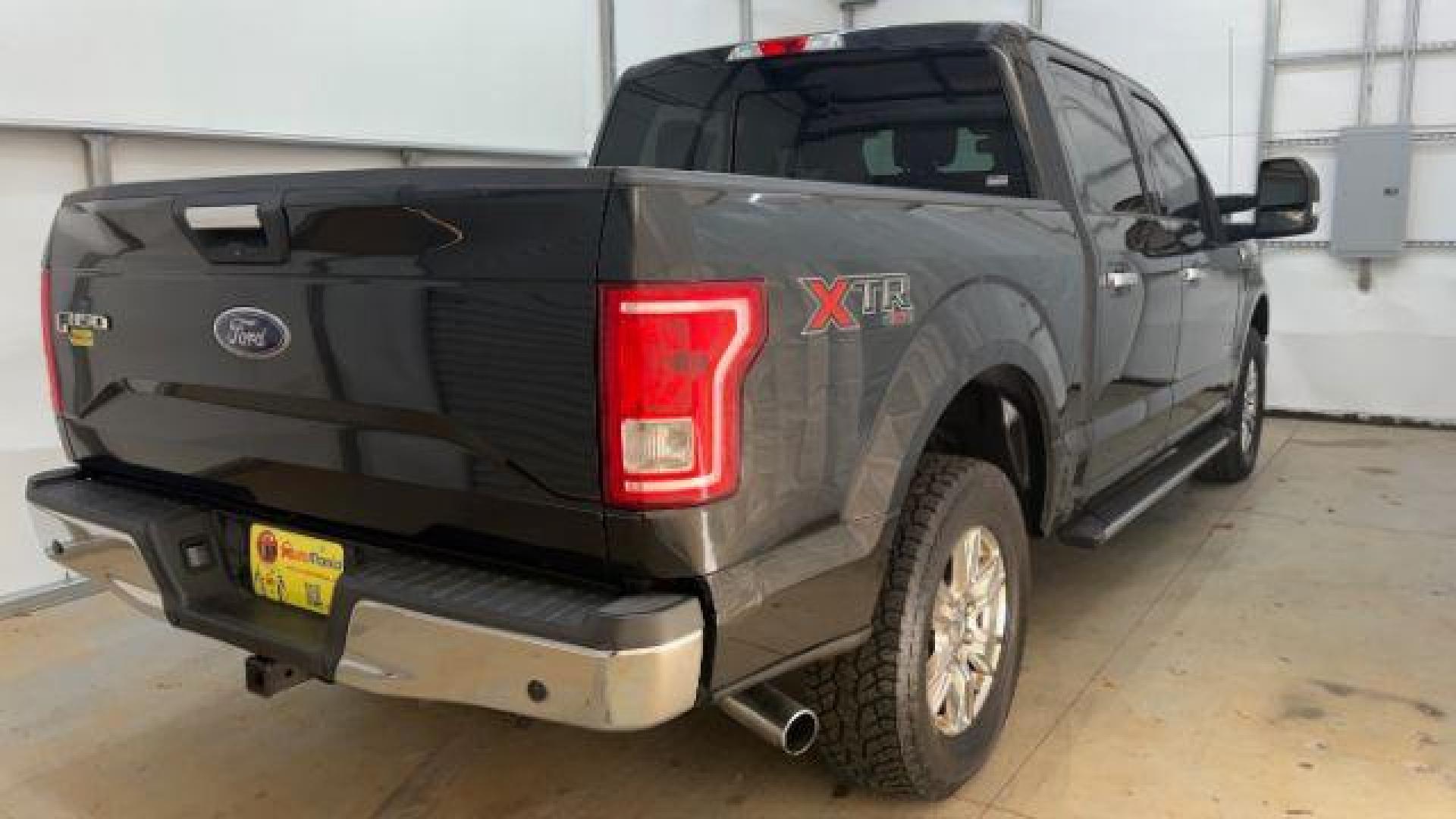 2015 Black Ford F-150 XLT (1FTEW1EG9FF) with an EcoBoost 3.5L V-6 gasoline direct injection engine, located at 1806 Veterans Memorial Hwy SW, Austell, GA, 30168, (770) 944-9558, 33.817959, -84.606987 - Photo#5