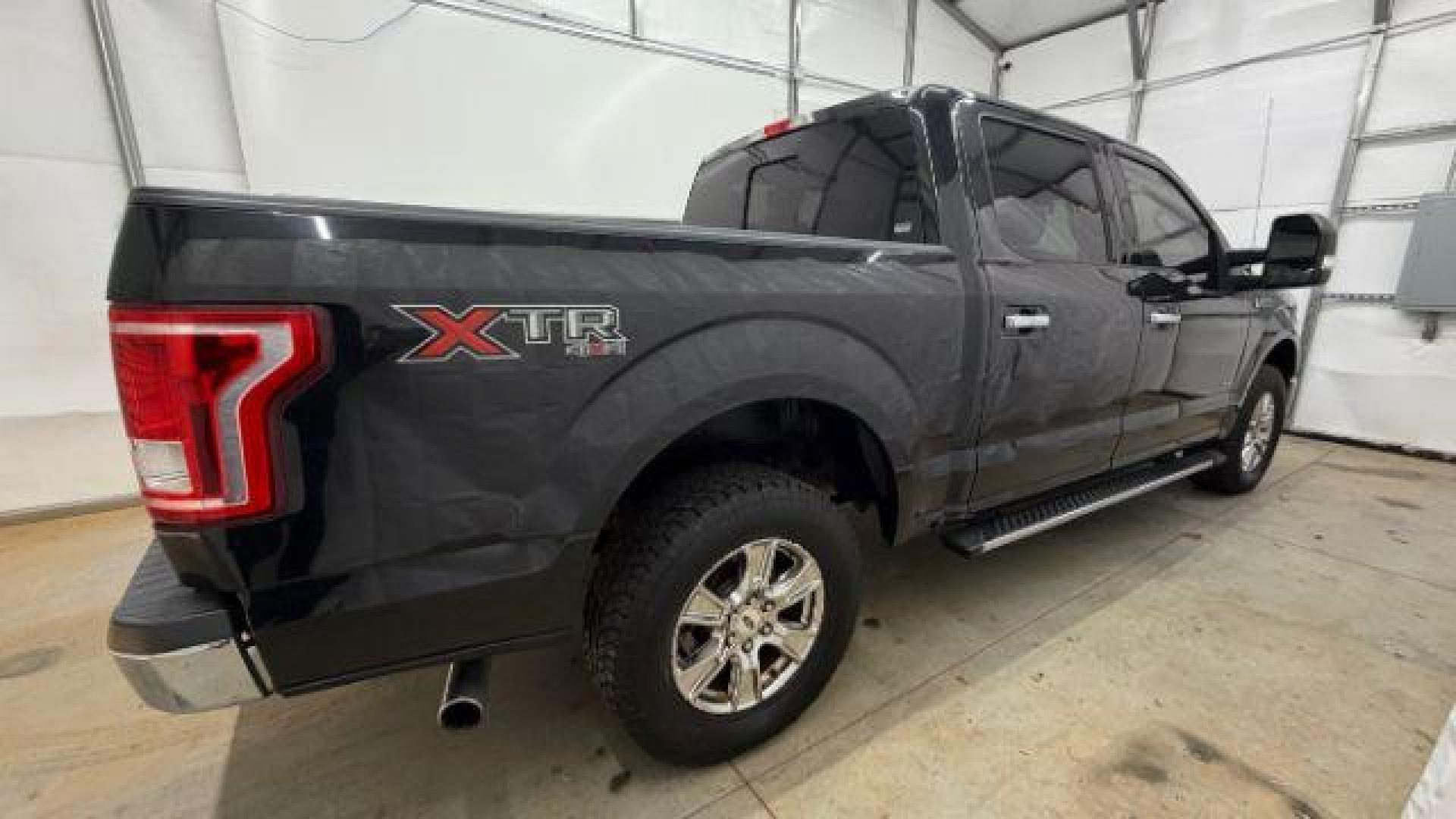 2015 Black Ford F-150 XLT (1FTEW1EG9FF) with an EcoBoost 3.5L V-6 gasoline direct injection engine, located at 1806 Veterans Memorial Hwy SW, Austell, GA, 30168, (770) 944-9558, 33.817959, -84.606987 - Photo#6