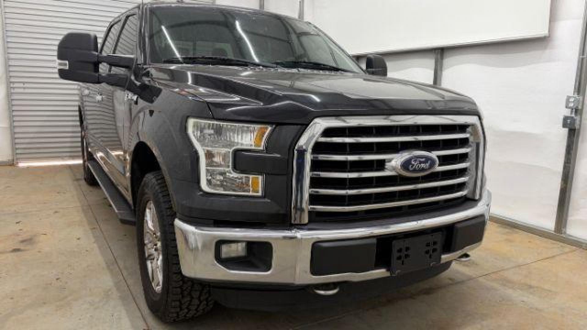 2015 Black Ford F-150 XLT (1FTEW1EG9FF) with an EcoBoost 3.5L V-6 gasoline direct injection engine, located at 1806 Veterans Memorial Hwy SW, Austell, GA, 30168, (770) 944-9558, 33.817959, -84.606987 - Photo#8