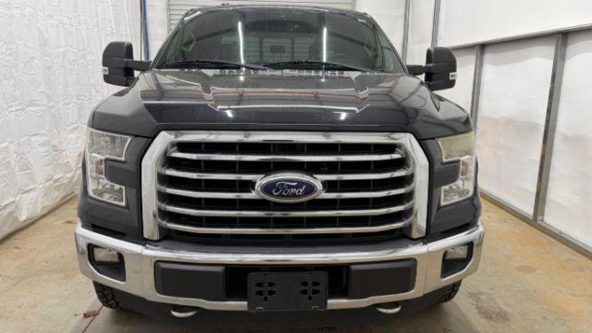 2015 Black Ford F-150 XLT (1FTEW1EG9FF) with an EcoBoost 3.5L V-6 gasoline direct injection engine, located at 1806 Veterans Memorial Hwy SW, Austell, GA, 30168, (770) 944-9558, 33.817959, -84.606987 - Photo#9