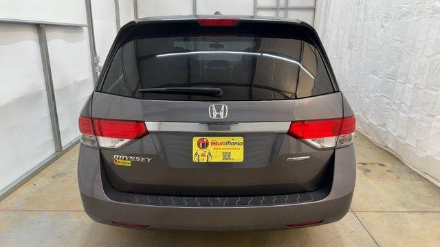 2016 Gray Honda Odyssey SE (5FNRL5H32GB) with an 3.5L V-6 i-VTEC variable valve control engine, located at 1806 Veterans Memorial Hwy SW, Austell, GA, 30168, (770) 944-9558, 33.817959, -84.606987 - Photo#3