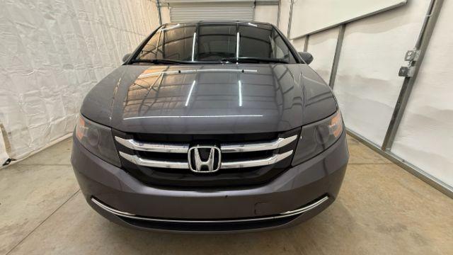 2016 Gray Honda Odyssey SE (5FNRL5H32GB) with an 3.5L V-6 i-VTEC variable valve control engine, located at 1806 Veterans Memorial Hwy SW, Austell, GA, 30168, (770) 944-9558, 33.817959, -84.606987 - Photo#9