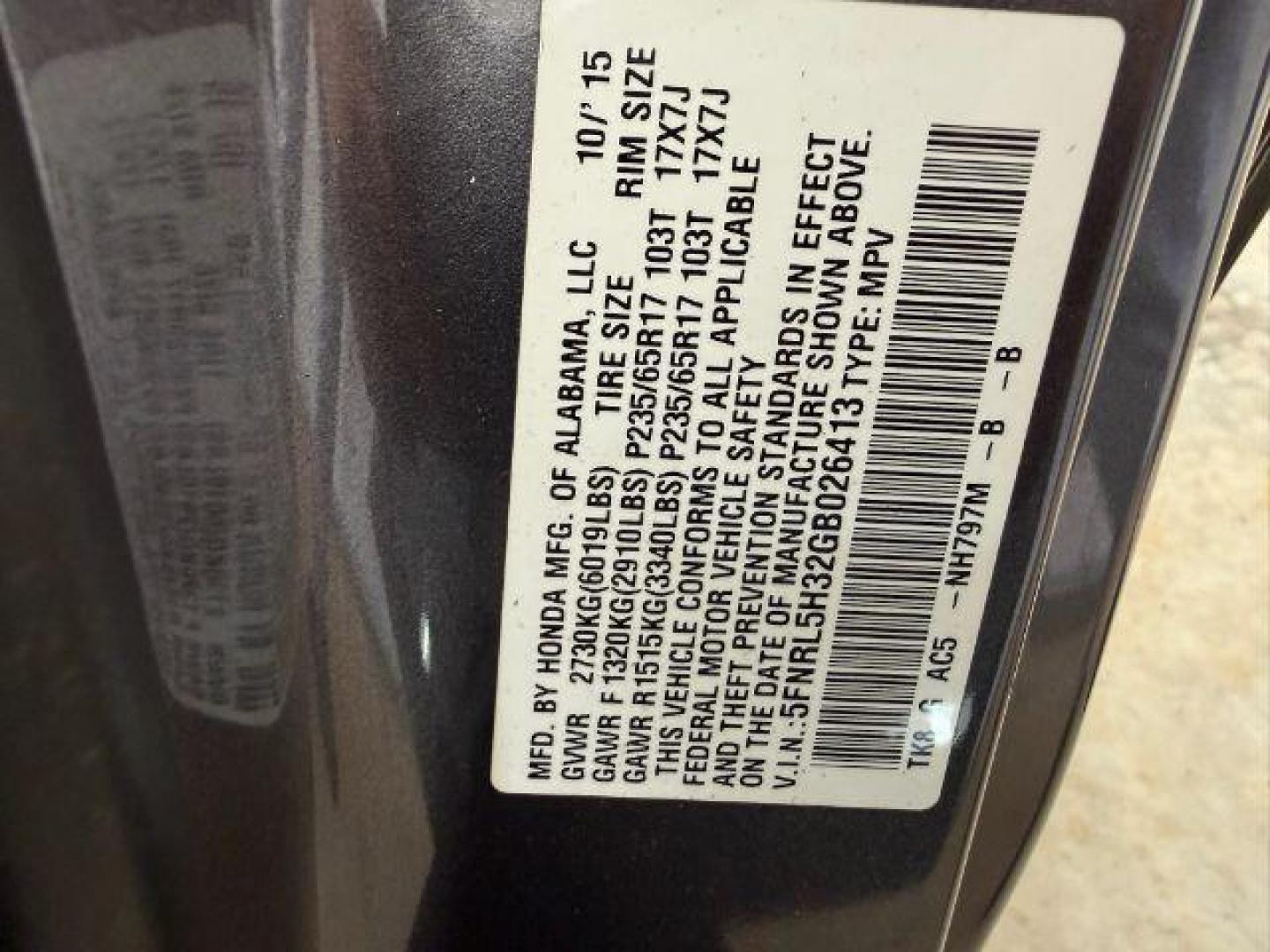 2016 Gray Honda Odyssey SE (5FNRL5H32GB) with an 3.5L V-6 i-VTEC variable valve control engine, located at 1806 Veterans Memorial Hwy SW, Austell, GA, 30168, (770) 944-9558, 33.817959, -84.606987 - Photo#23