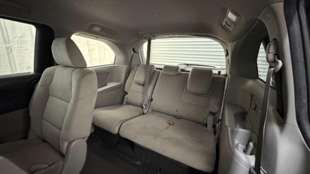 2016 Gray Honda Odyssey SE (5FNRL5H32GB) with an 3.5L V-6 i-VTEC variable valve control engine, located at 1806 Veterans Memorial Hwy SW, Austell, GA, 30168, (770) 944-9558, 33.817959, -84.606987 - Photo#14