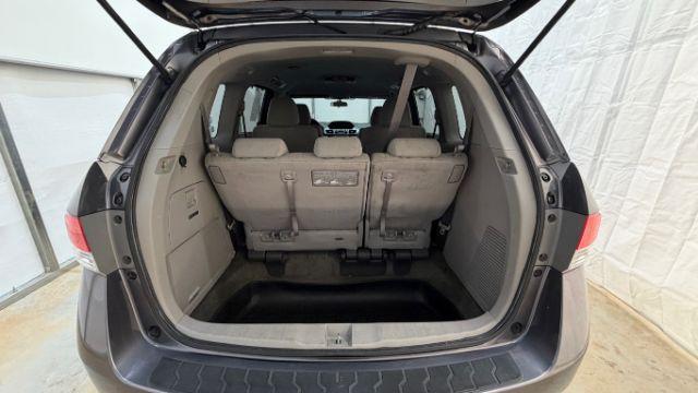 2016 Gray Honda Odyssey SE (5FNRL5H32GB) with an 3.5L V-6 i-VTEC variable valve control engine, located at 1806 Veterans Memorial Hwy SW, Austell, GA, 30168, (770) 944-9558, 33.817959, -84.606987 - Photo#16