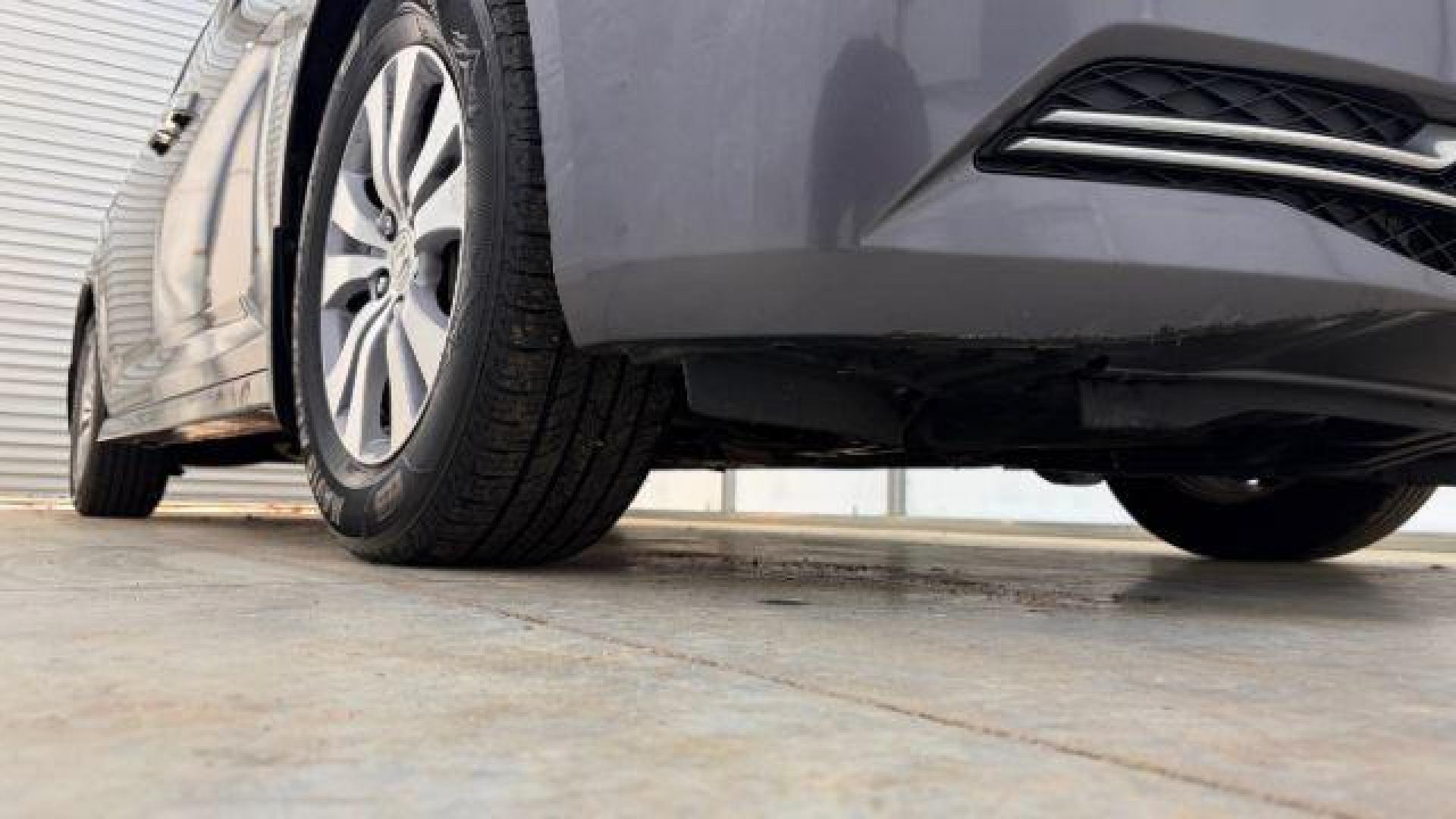 2016 Gray Honda Odyssey SE (5FNRL5H32GB) with an 3.5L V-6 i-VTEC variable valve control engine, located at 1806 Veterans Memorial Hwy SW, Austell, GA, 30168, (770) 944-9558, 33.817959, -84.606987 - Photo#19