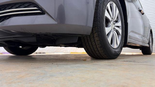 2016 Gray Honda Odyssey SE (5FNRL5H32GB) with an 3.5L V-6 i-VTEC variable valve control engine, located at 1806 Veterans Memorial Hwy SW, Austell, GA, 30168, (770) 944-9558, 33.817959, -84.606987 - Photo#21