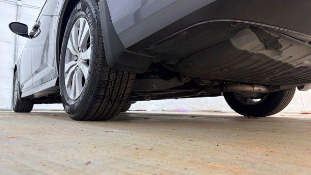 2016 Gray Honda Odyssey SE (5FNRL5H32GB) with an 3.5L V-6 i-VTEC variable valve control engine, located at 1806 Veterans Memorial Hwy SW, Austell, GA, 30168, (770) 944-9558, 33.817959, -84.606987 - Photo#22