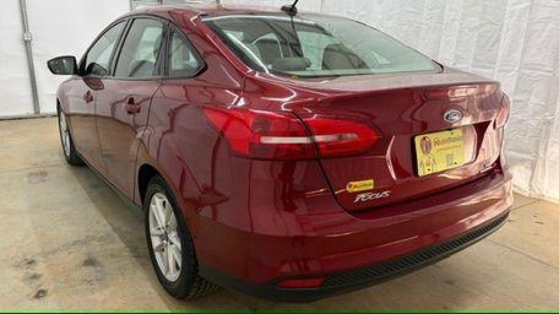 2016 Red Ford Focus SE (1FADP3F21GL) , located at 1806 Veterans Memorial Hwy SW, Austell, GA, 30168, (770) 944-9558, 33.817959, -84.606987 - Photo#3