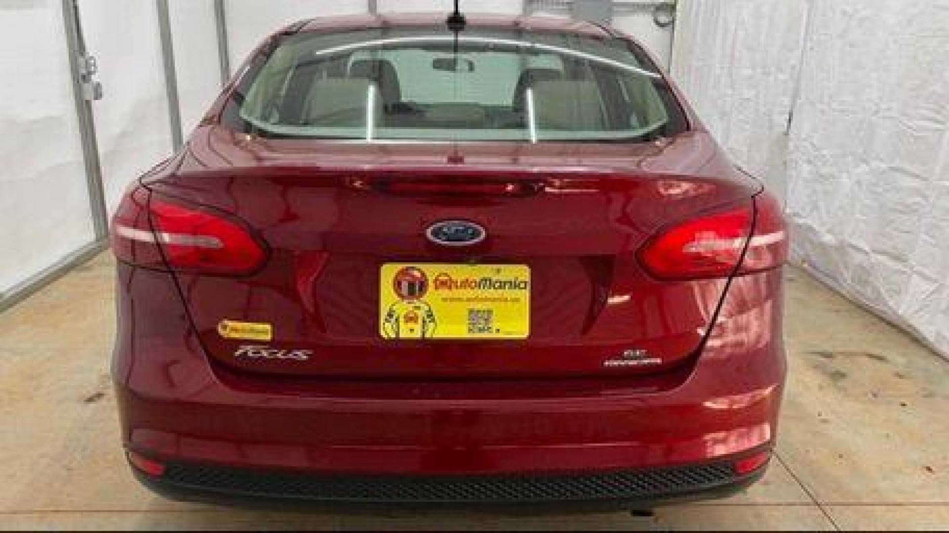 2016 Red Ford Focus SE (1FADP3F21GL) , located at 1806 Veterans Memorial Hwy SW, Austell, GA, 30168, (770) 944-9558, 33.817959, -84.606987 - Photo#4