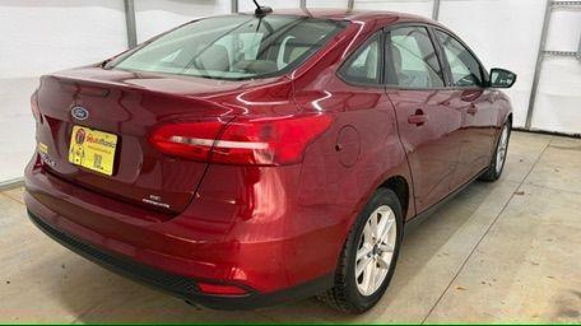 2016 Red Ford Focus SE (1FADP3F21GL) , located at 1806 Veterans Memorial Hwy SW, Austell, GA, 30168, (770) 944-9558, 33.817959, -84.606987 - Photo#5