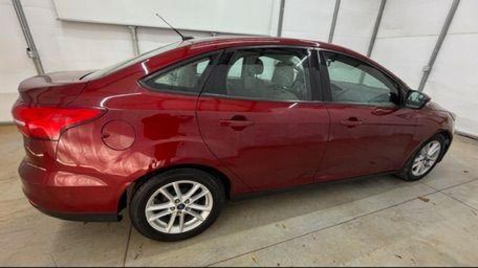 2016 Red Ford Focus SE (1FADP3F21GL) , located at 1806 Veterans Memorial Hwy SW, Austell, GA, 30168, (770) 944-9558, 33.817959, -84.606987 - Photo#6