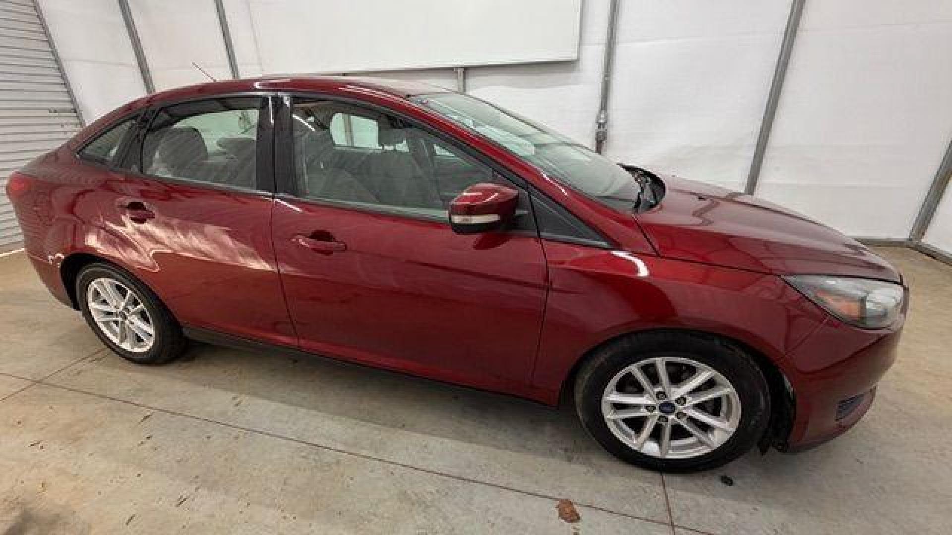 2016 Red Ford Focus SE (1FADP3F21GL) , located at 1806 Veterans Memorial Hwy SW, Austell, GA, 30168, (770) 944-9558, 33.817959, -84.606987 - Photo#7