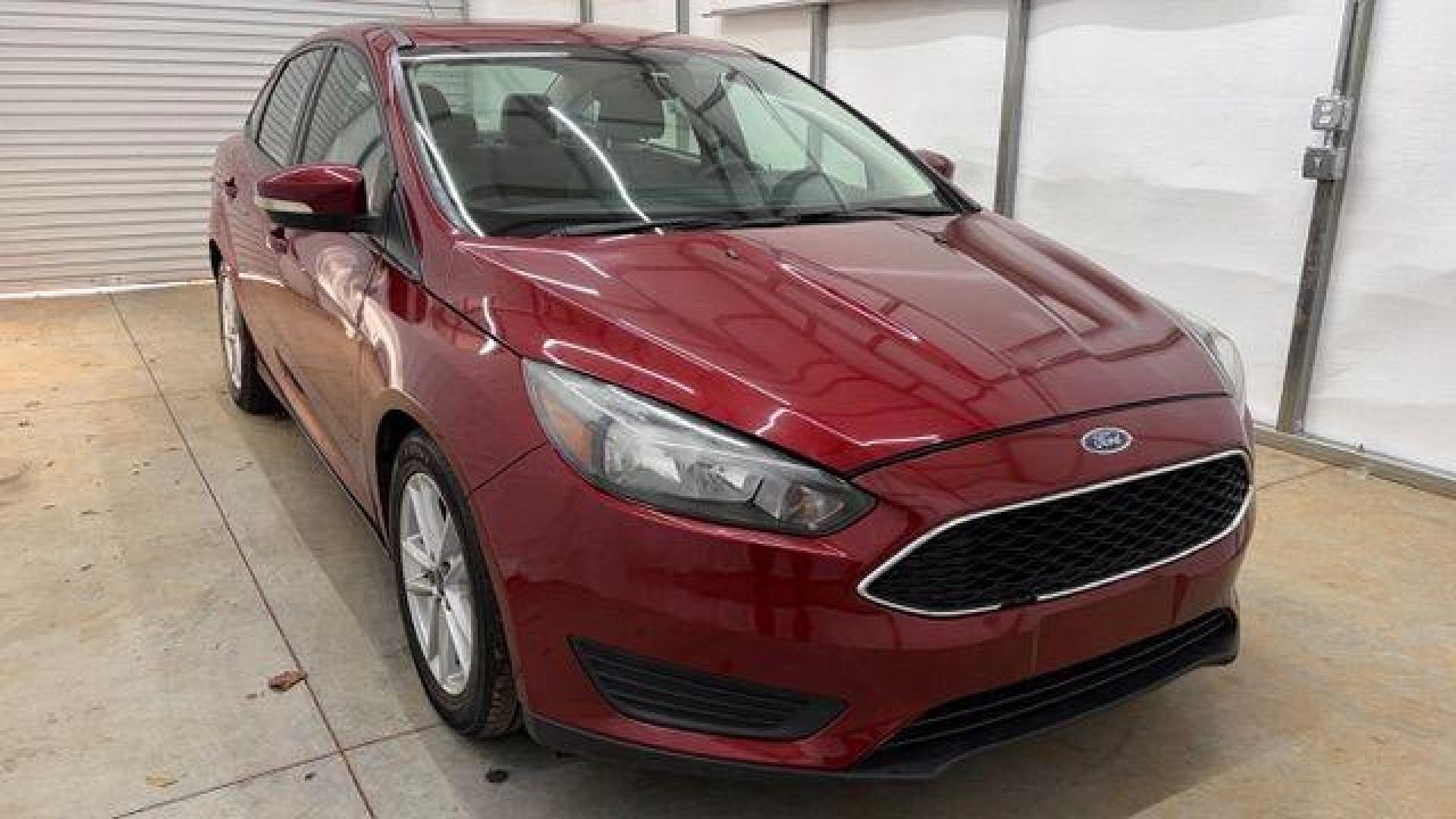 2016 Red Ford Focus SE (1FADP3F21GL) , located at 1806 Veterans Memorial Hwy SW, Austell, GA, 30168, (770) 944-9558, 33.817959, -84.606987 - Photo#8