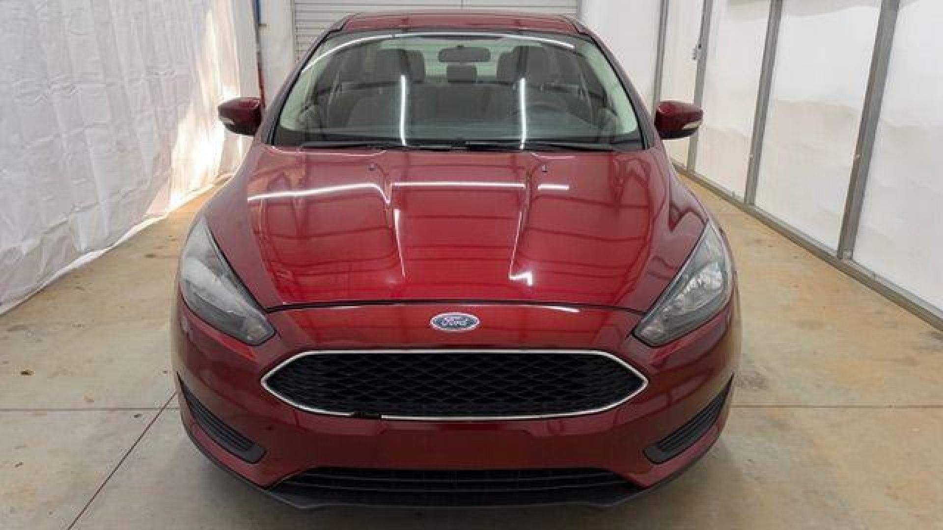 2016 Red Ford Focus SE (1FADP3F21GL) , located at 1806 Veterans Memorial Hwy SW, Austell, GA, 30168, (770) 944-9558, 33.817959, -84.606987 - Photo#9