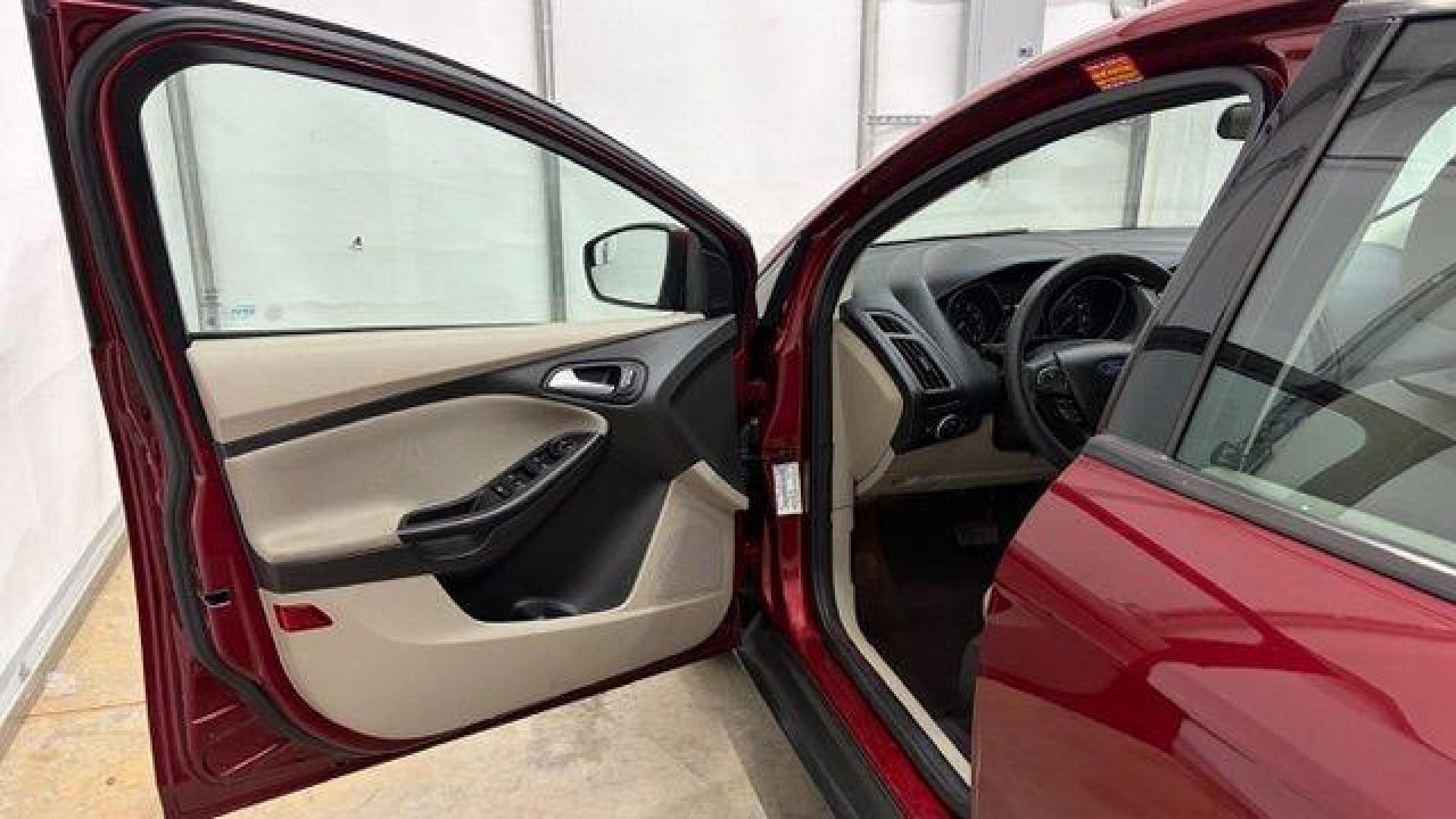 2016 Red Ford Focus SE (1FADP3F21GL) , located at 1806 Veterans Memorial Hwy SW, Austell, GA, 30168, (770) 944-9558, 33.817959, -84.606987 - Photo#10