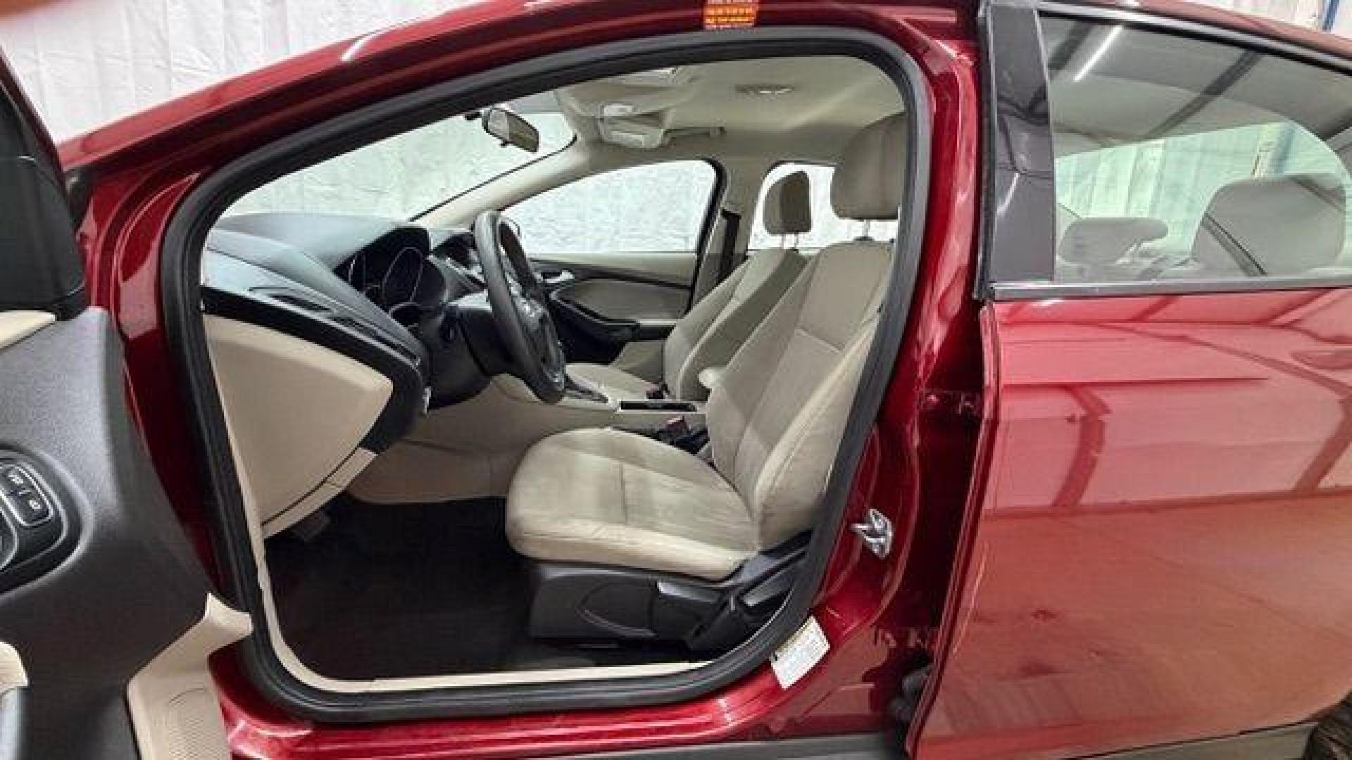 2016 Red Ford Focus SE (1FADP3F21GL) , located at 1806 Veterans Memorial Hwy SW, Austell, GA, 30168, (770) 944-9558, 33.817959, -84.606987 - Photo#12