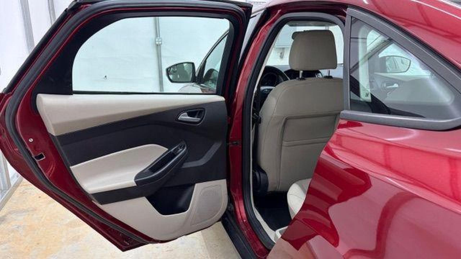 2016 Red Ford Focus SE (1FADP3F21GL) , located at 1806 Veterans Memorial Hwy SW, Austell, GA, 30168, (770) 944-9558, 33.817959, -84.606987 - Photo#13