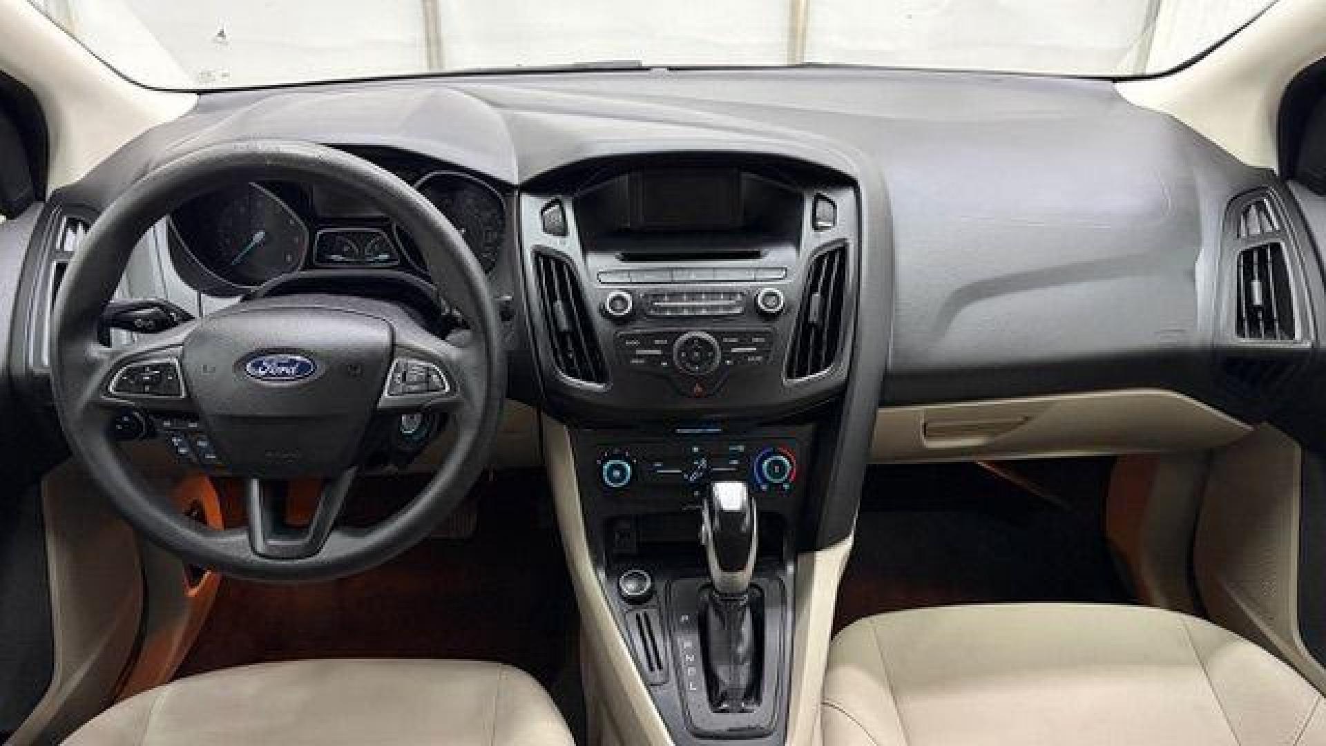 2016 Red Ford Focus SE (1FADP3F21GL) , located at 1806 Veterans Memorial Hwy SW, Austell, GA, 30168, (770) 944-9558, 33.817959, -84.606987 - Photo#15