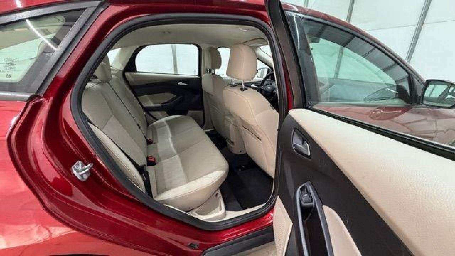 2016 Red Ford Focus SE (1FADP3F21GL) , located at 1806 Veterans Memorial Hwy SW, Austell, GA, 30168, (770) 944-9558, 33.817959, -84.606987 - Photo#16