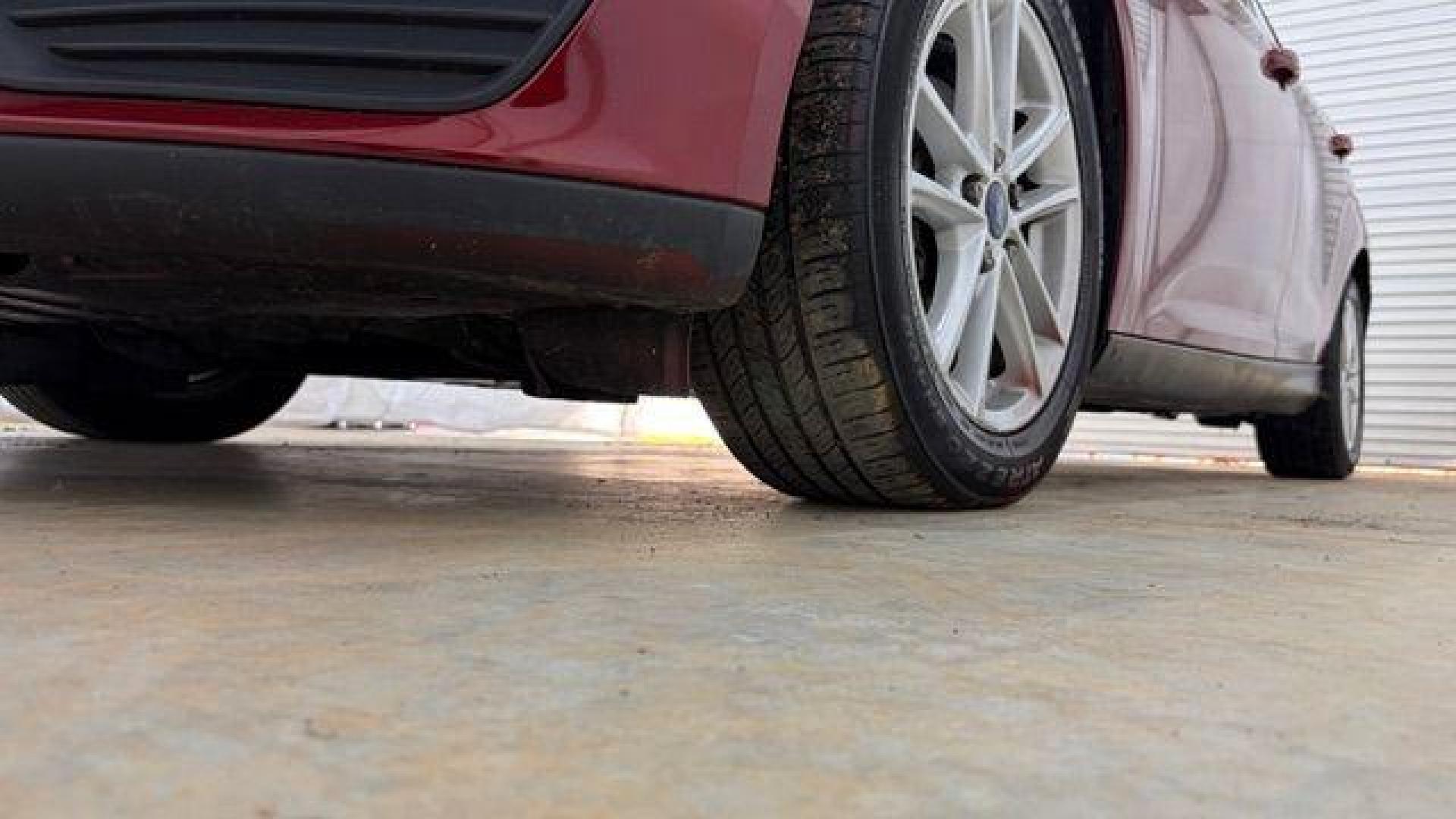 2016 Red Ford Focus SE (1FADP3F21GL) , located at 1806 Veterans Memorial Hwy SW, Austell, GA, 30168, (770) 944-9558, 33.817959, -84.606987 - Photo#20