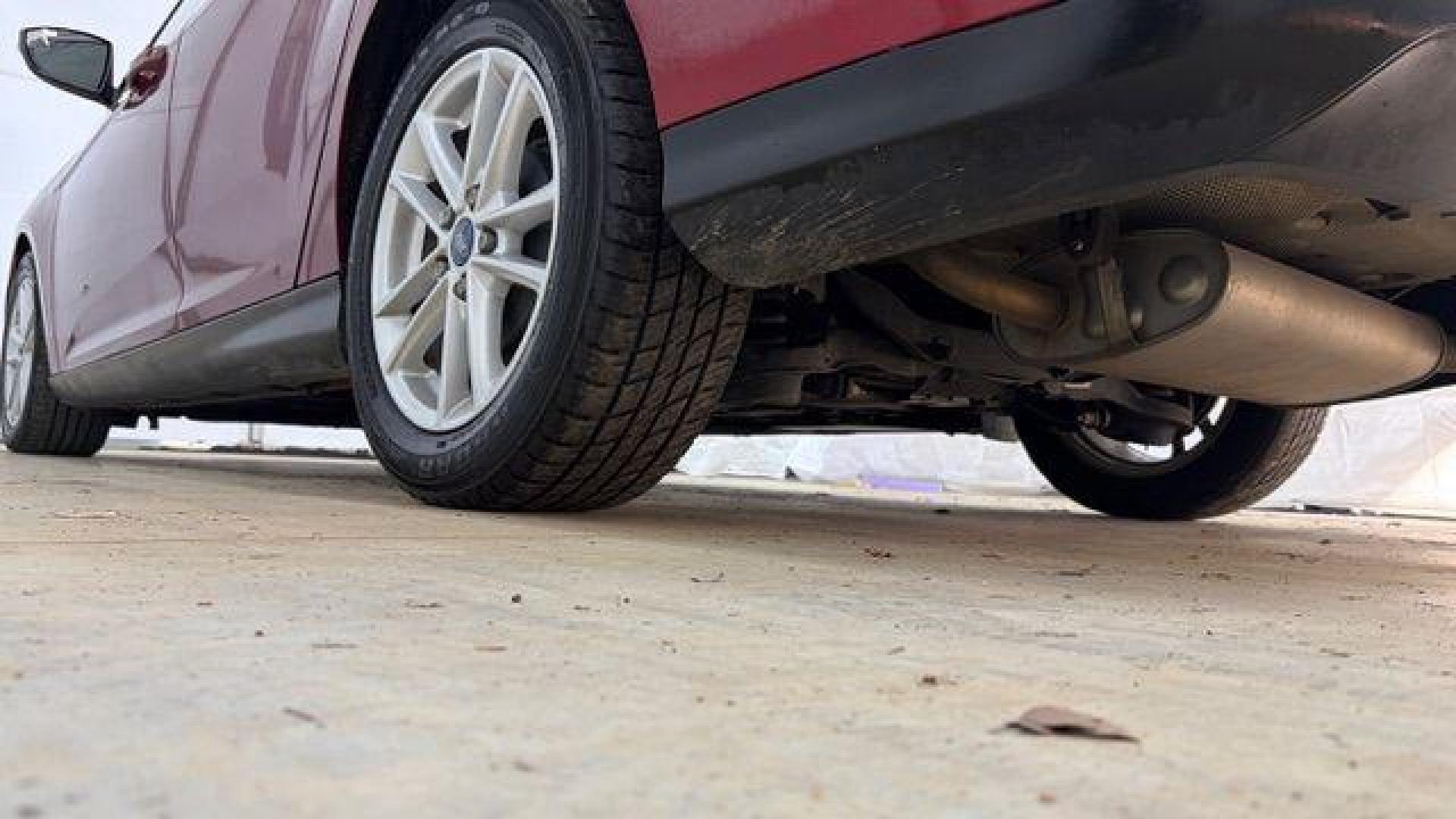 2016 Red Ford Focus SE (1FADP3F21GL) , located at 1806 Veterans Memorial Hwy SW, Austell, GA, 30168, (770) 944-9558, 33.817959, -84.606987 - Photo#21