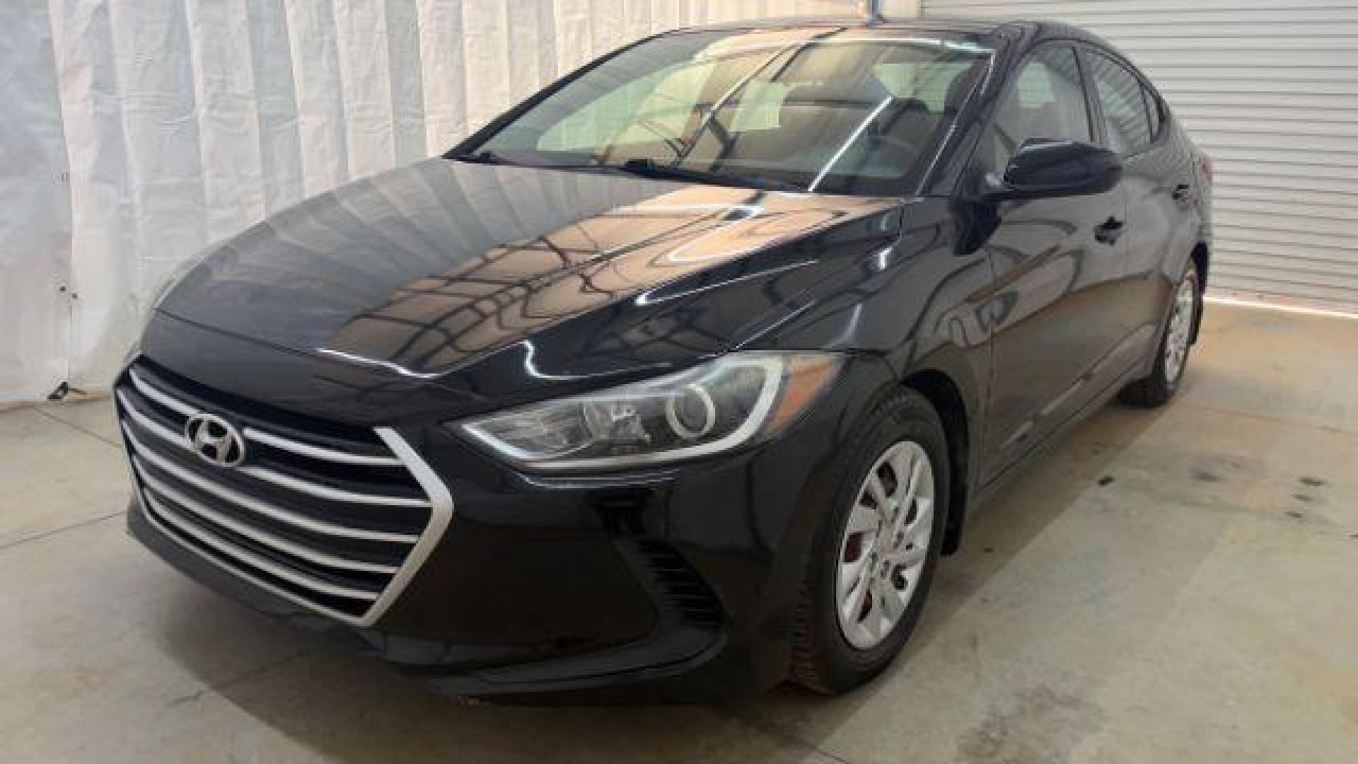 2018 Black Hyundai Elantra SE (5NPD74LF1JH) with an Nu 2L I-4 DOHC engine, located at 1806 Veterans Memorial Hwy SW, Austell, GA, 30168, (770) 944-9558, 33.817959, -84.606987 - Photo#0
