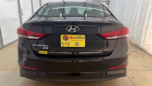 2018 Black Hyundai Elantra SE (5NPD74LF1JH) with an Nu 2L I-4 DOHC engine, located at 1806 Veterans Memorial Hwy SW, Austell, GA, 30168, (770) 944-9558, 33.817959, -84.606987 - Photo#4