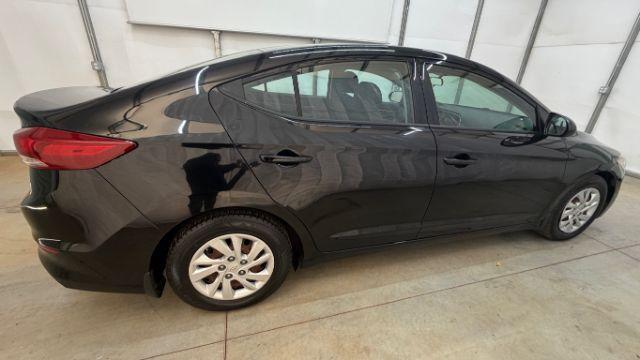 2018 Black Hyundai Elantra SE (5NPD74LF1JH) with an Nu 2L I-4 DOHC engine, located at 1806 Veterans Memorial Hwy SW, Austell, GA, 30168, (770) 944-9558, 33.817959, -84.606987 - Photo#6