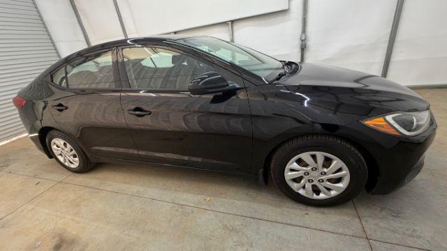 2018 Black Hyundai Elantra SE (5NPD74LF1JH) with an Nu 2L I-4 DOHC engine, located at 1806 Veterans Memorial Hwy SW, Austell, GA, 30168, (770) 944-9558, 33.817959, -84.606987 - Photo#7
