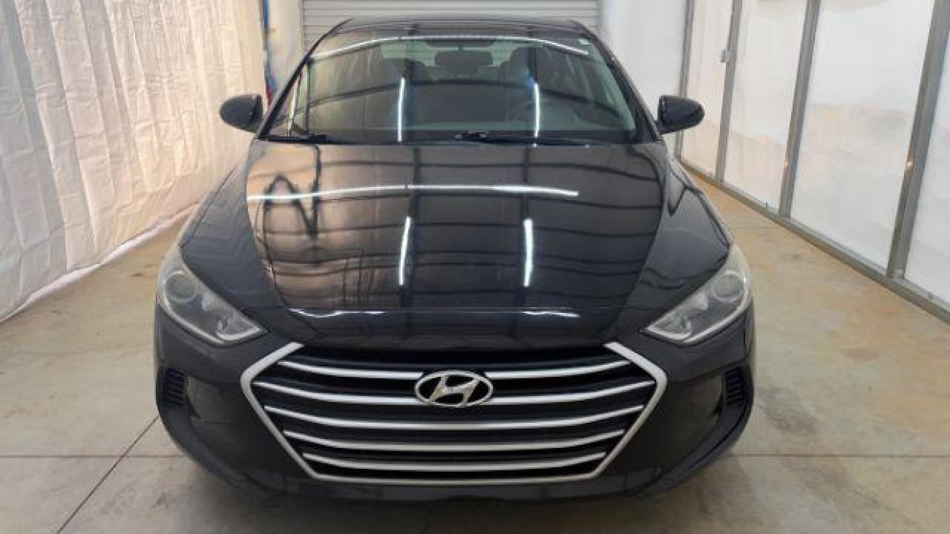 2018 Black Hyundai Elantra SE (5NPD74LF1JH) with an Nu 2L I-4 DOHC engine, located at 1806 Veterans Memorial Hwy SW, Austell, GA, 30168, (770) 944-9558, 33.817959, -84.606987 - Photo#8