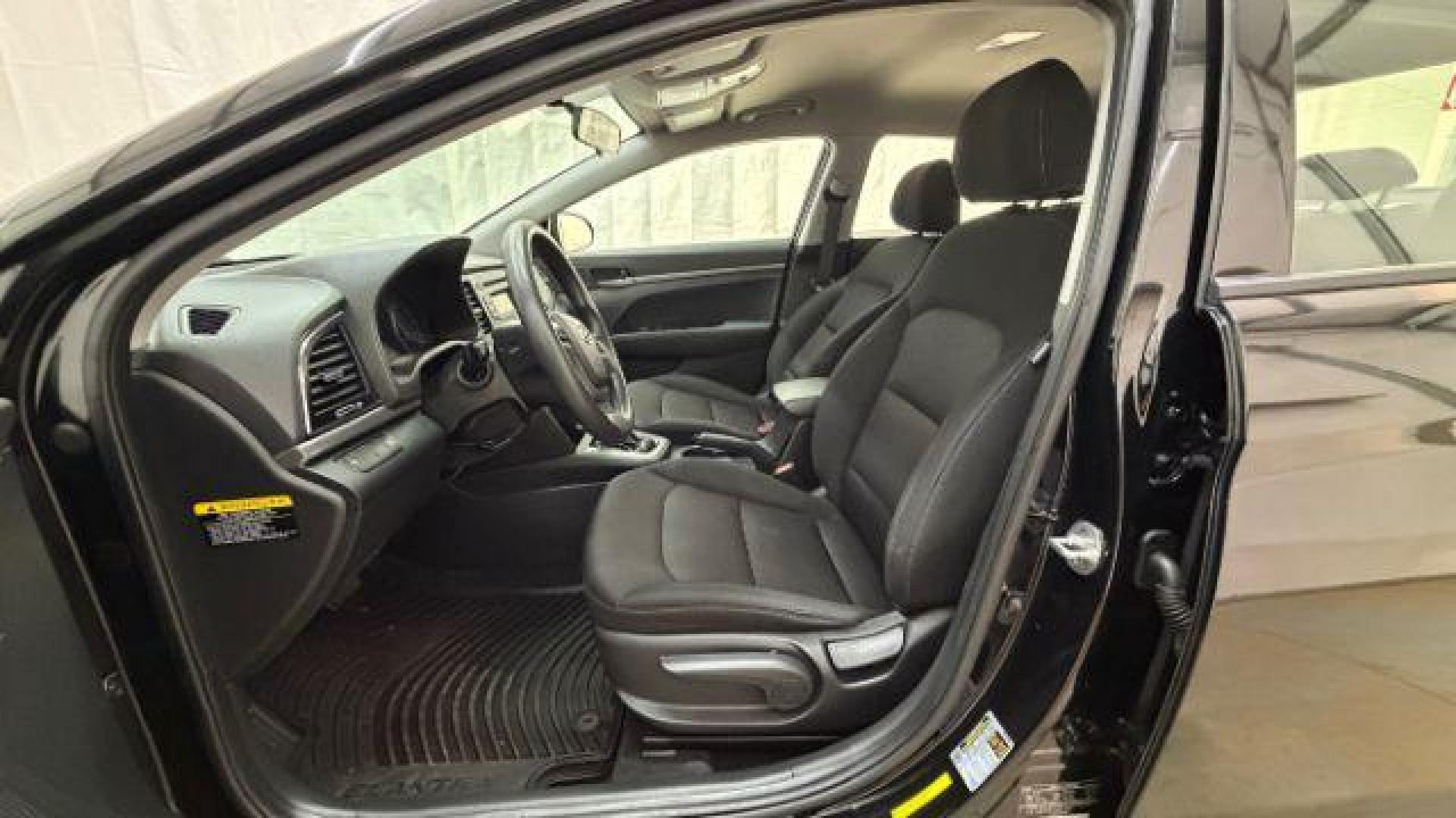 2018 Black Hyundai Elantra SE (5NPD74LF1JH) with an Nu 2L I-4 DOHC engine, located at 1806 Veterans Memorial Hwy SW, Austell, GA, 30168, (770) 944-9558, 33.817959, -84.606987 - Photo#11