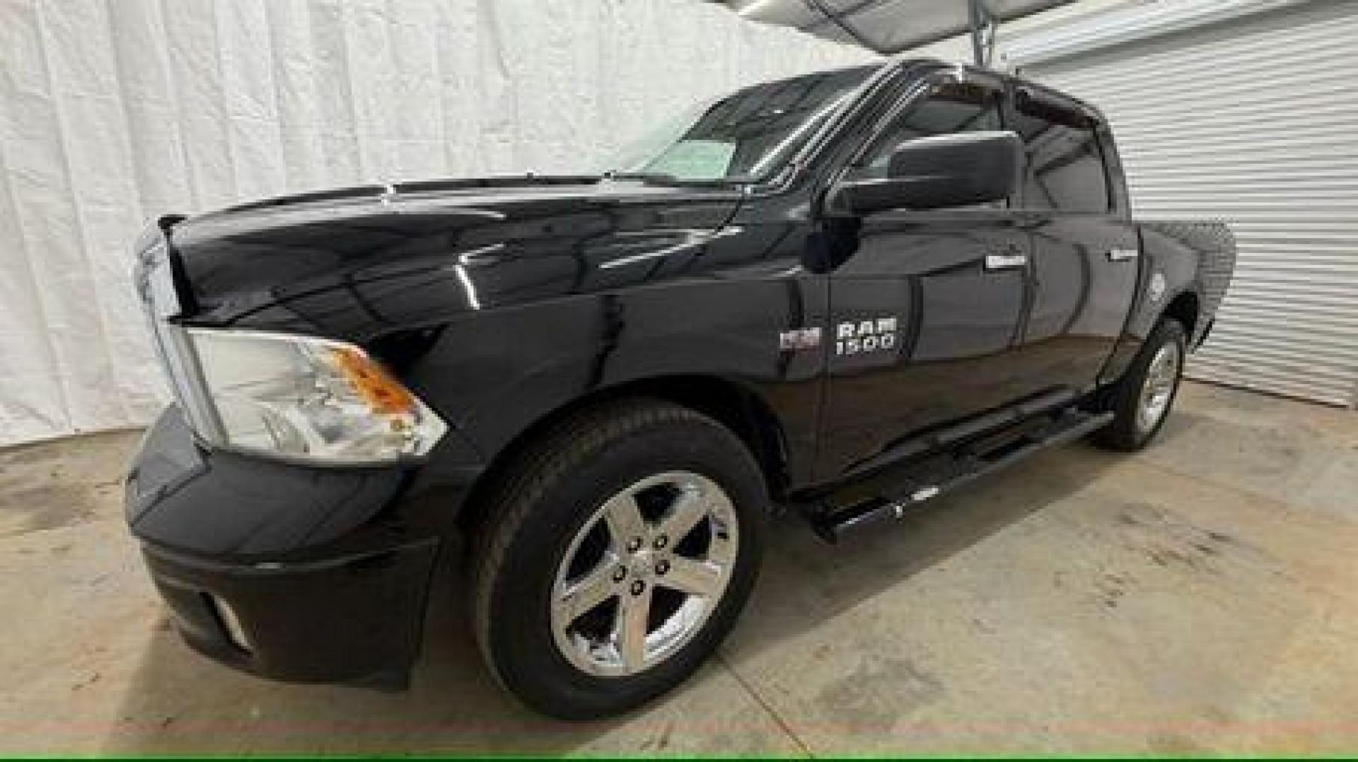 2013 Black Ram 1500 Big Horn (1C6RR6LT4DS) with an HEMI 5.7L V-8 variable valve control engine, located at 1806 Veterans Memorial Hwy SW, Austell, GA, 30168, (770) 944-9558, 33.817959, -84.606987 - Photo#1