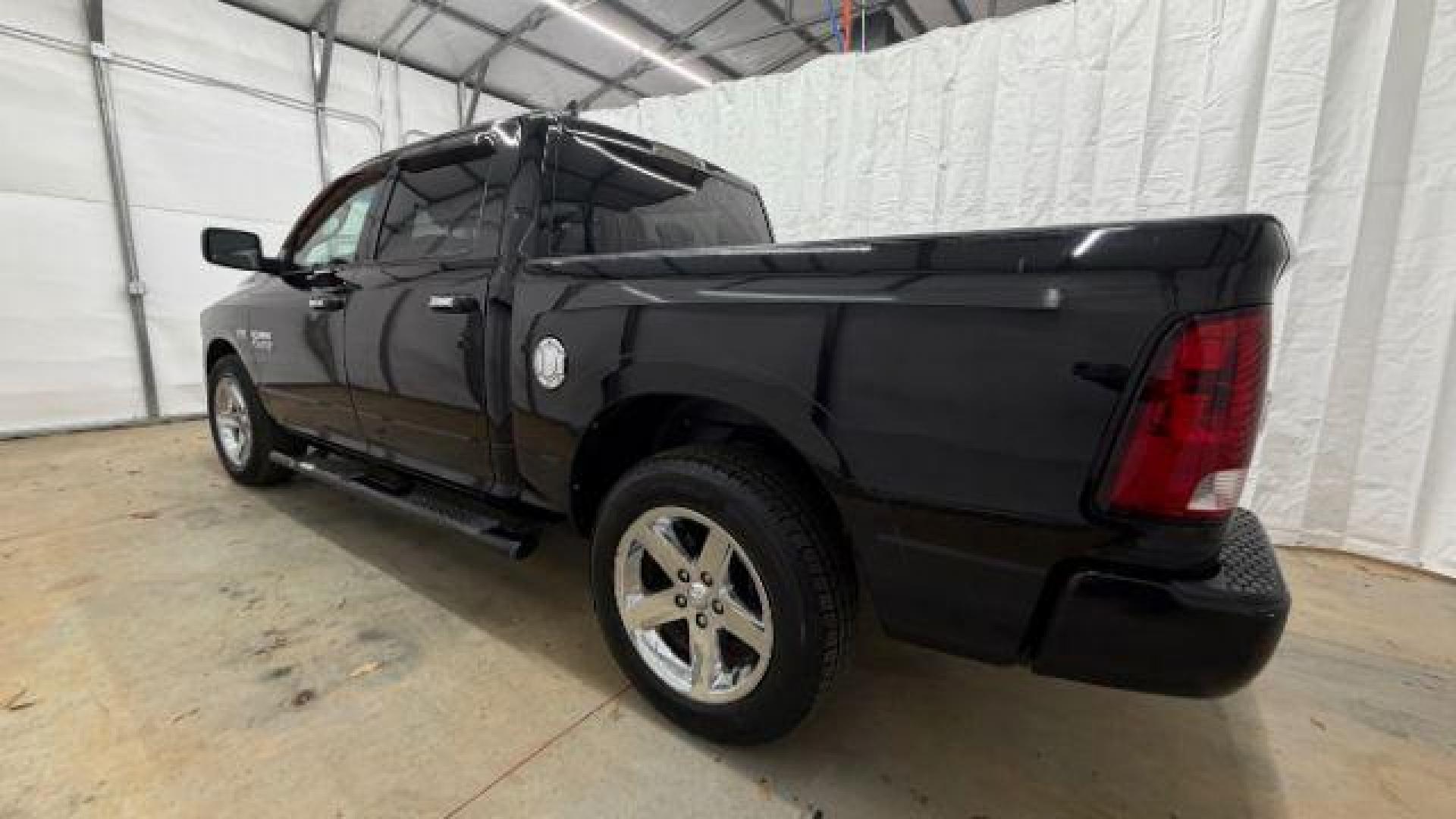 2013 Black Ram 1500 Big Horn (1C6RR6LT4DS) with an HEMI 5.7L V-8 variable valve control engine, located at 1806 Veterans Memorial Hwy SW, Austell, GA, 30168, (770) 944-9558, 33.817959, -84.606987 - Photo#2