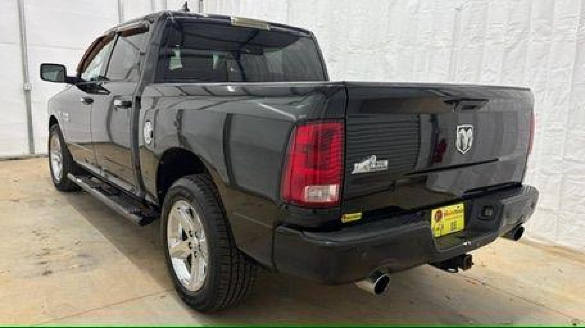 2013 Black Ram 1500 Big Horn (1C6RR6LT4DS) with an HEMI 5.7L V-8 variable valve control engine, located at 1806 Veterans Memorial Hwy SW, Austell, GA, 30168, (770) 944-9558, 33.817959, -84.606987 - Photo#3