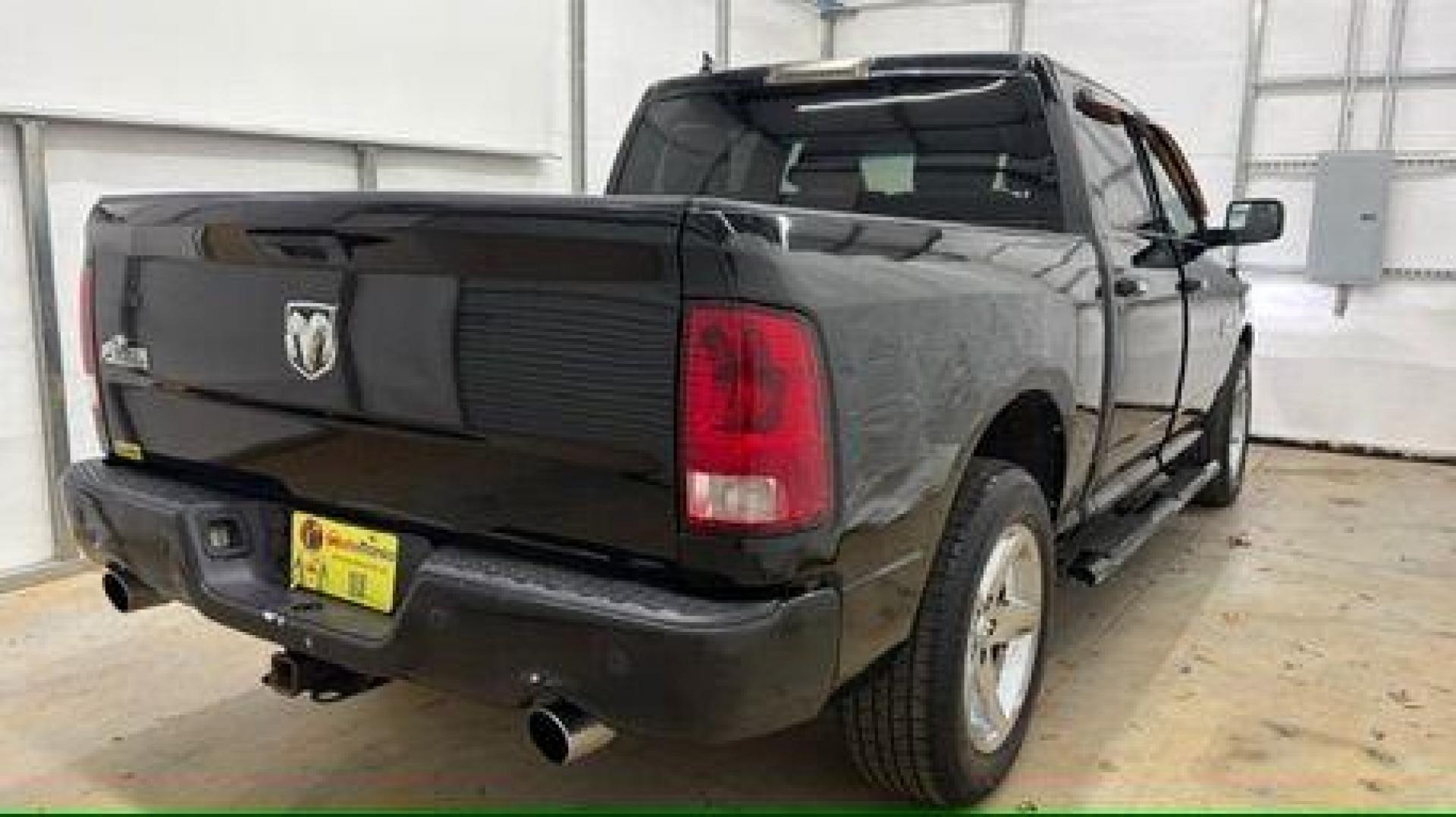 2013 Black Ram 1500 Big Horn (1C6RR6LT4DS) with an HEMI 5.7L V-8 variable valve control engine, located at 1806 Veterans Memorial Hwy SW, Austell, GA, 30168, (770) 944-9558, 33.817959, -84.606987 - Photo#5