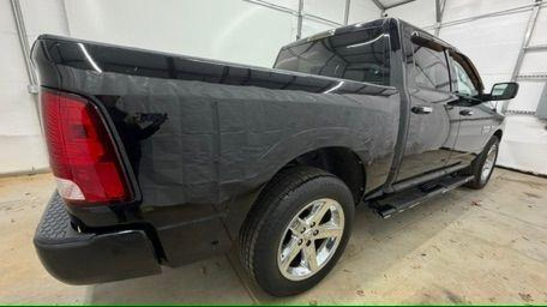 2013 Black Ram 1500 Big Horn (1C6RR6LT4DS) with an HEMI 5.7L V-8 variable valve control engine, located at 1806 Veterans Memorial Hwy SW, Austell, GA, 30168, (770) 944-9558, 33.817959, -84.606987 - Photo#6