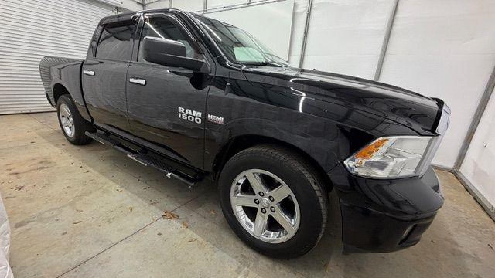 2013 Black Ram 1500 Big Horn (1C6RR6LT4DS) with an HEMI 5.7L V-8 variable valve control engine, located at 1806 Veterans Memorial Hwy SW, Austell, GA, 30168, (770) 944-9558, 33.817959, -84.606987 - Photo#7