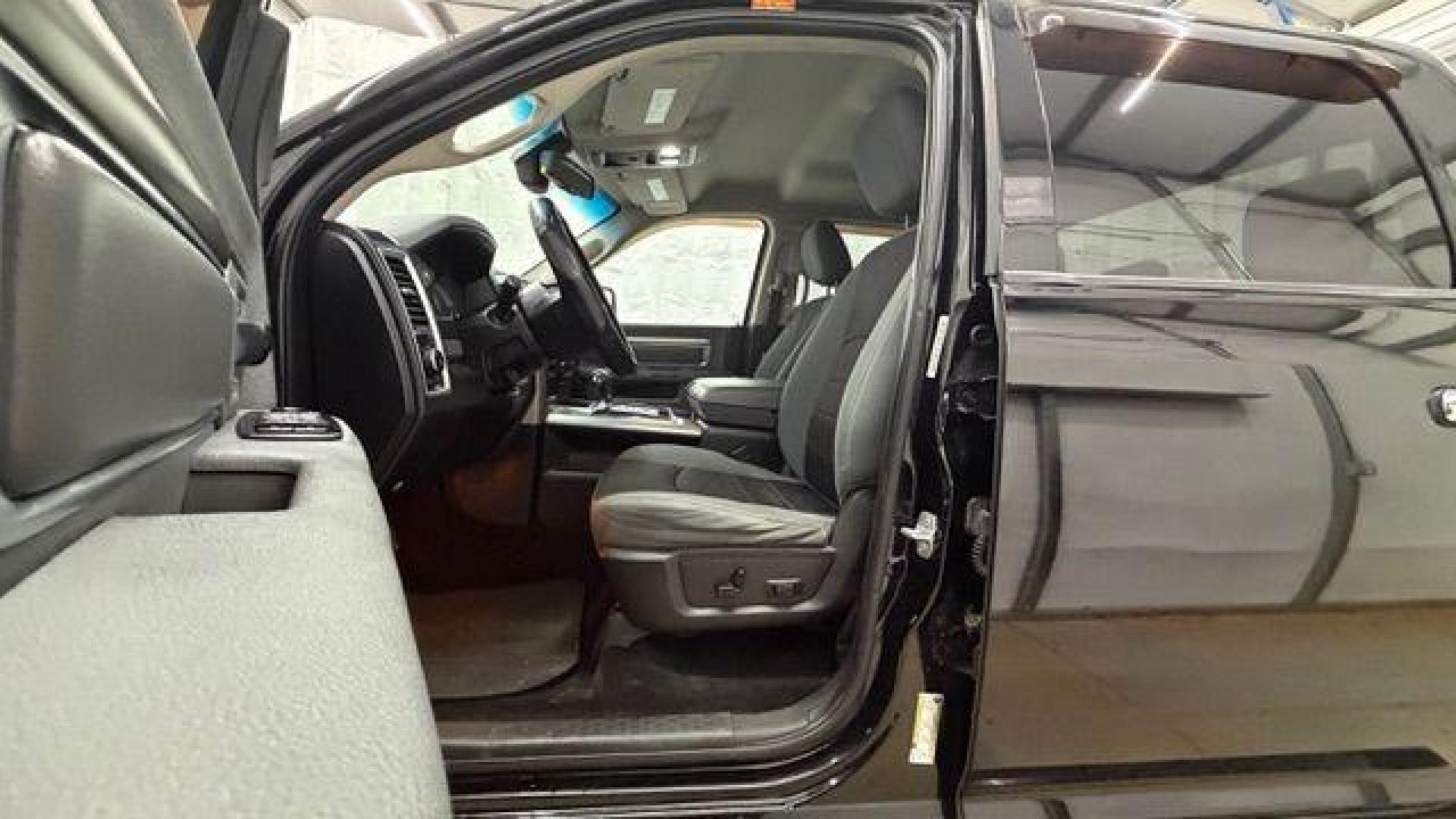 2013 Black Ram 1500 Big Horn (1C6RR6LT4DS) with an HEMI 5.7L V-8 variable valve control engine, located at 1806 Veterans Memorial Hwy SW, Austell, GA, 30168, (770) 944-9558, 33.817959, -84.606987 - Photo#12