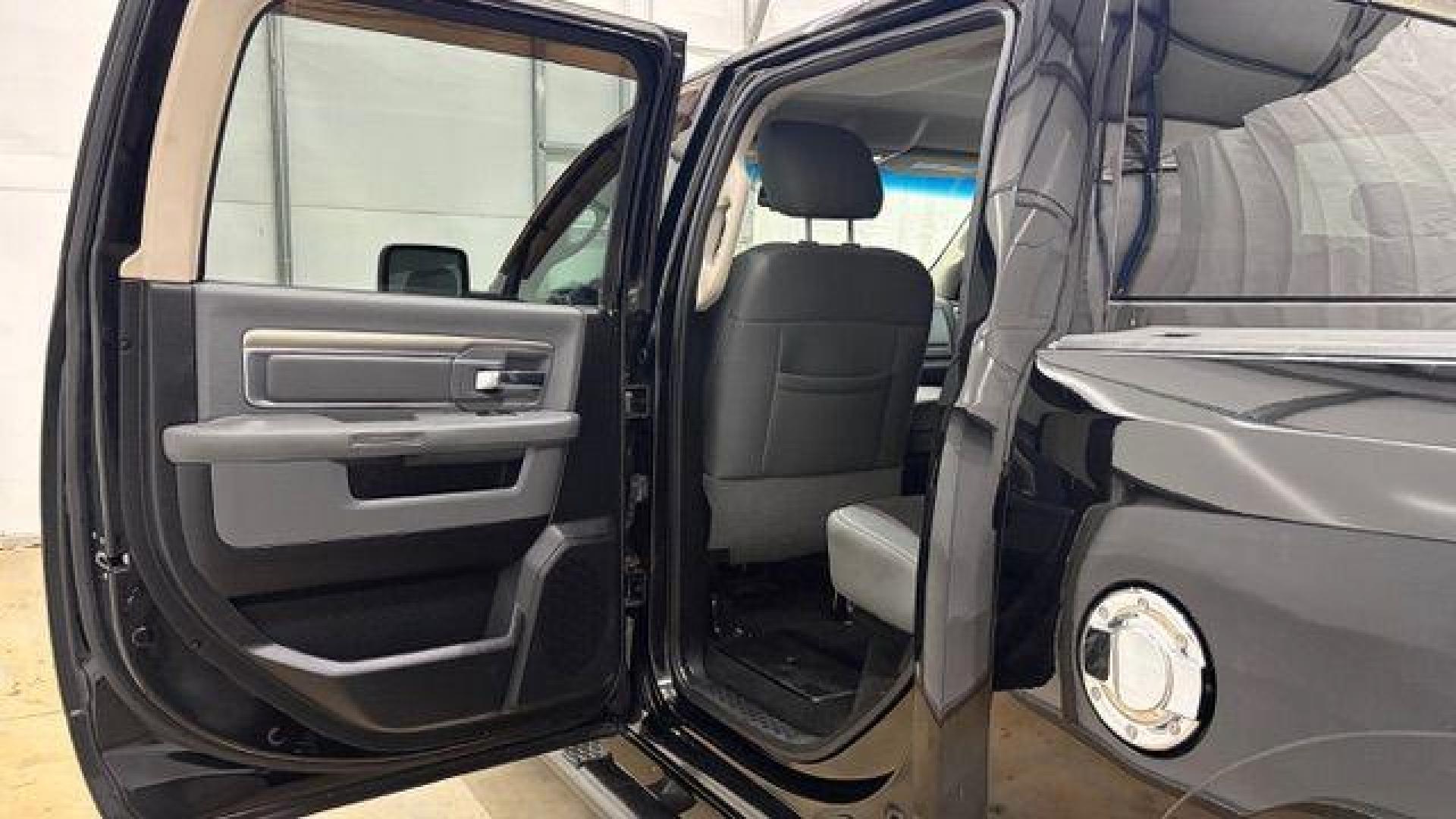 2013 Black Ram 1500 Big Horn (1C6RR6LT4DS) with an HEMI 5.7L V-8 variable valve control engine, located at 1806 Veterans Memorial Hwy SW, Austell, GA, 30168, (770) 944-9558, 33.817959, -84.606987 - Photo#13