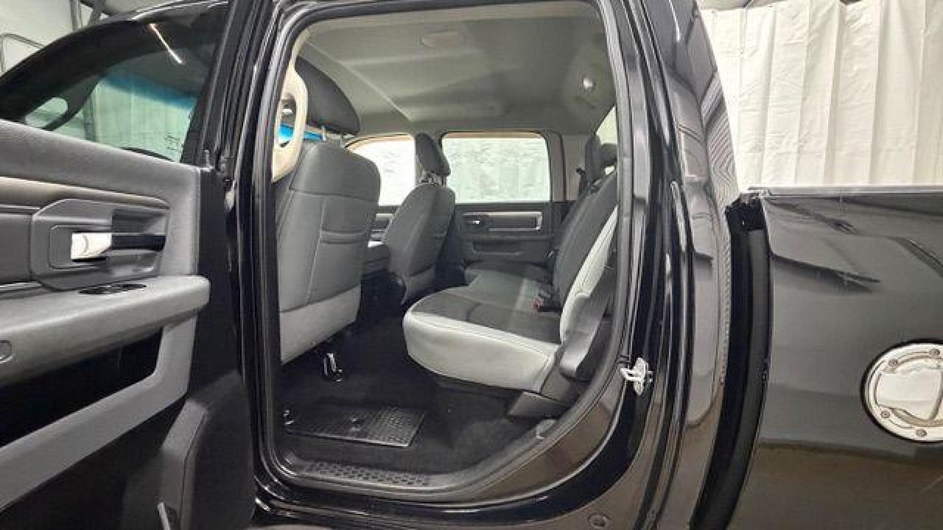 2013 Black Ram 1500 Big Horn (1C6RR6LT4DS) with an HEMI 5.7L V-8 variable valve control engine, located at 1806 Veterans Memorial Hwy SW, Austell, GA, 30168, (770) 944-9558, 33.817959, -84.606987 - Photo#14