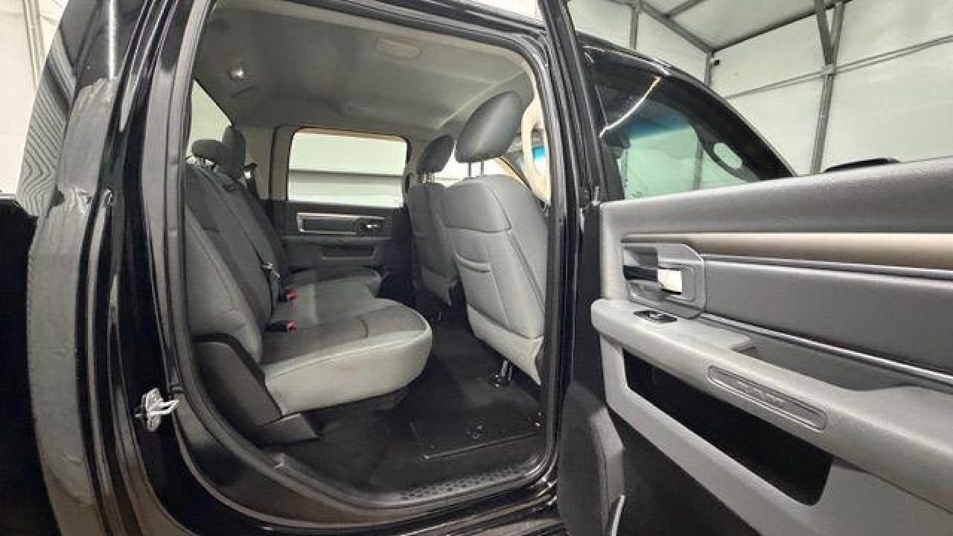 2013 Black Ram 1500 Big Horn (1C6RR6LT4DS) with an HEMI 5.7L V-8 variable valve control engine, located at 1806 Veterans Memorial Hwy SW, Austell, GA, 30168, (770) 944-9558, 33.817959, -84.606987 - Photo#16